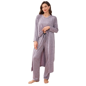 Three-piece women's pajama set featuring a V-neck top, long pants, and a knit cardigan