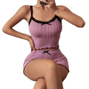 Women's two-piece ribbed knit pajama set with lace trim and bow in light purple