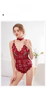 Detail view of red lace lingerie set with rose embroidery and matching choker accessory