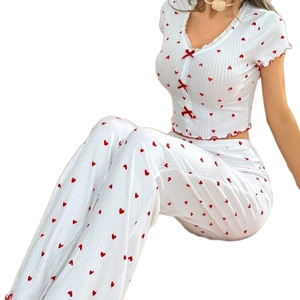 Women's white pajama set with red heart print, V-neck top with bows and matching pants