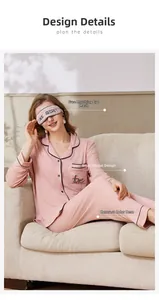 Pink ribbed pajamas set with contrasting black piping and love detail on pocket