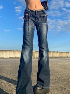Slim fit flared high waist jeans with dark wash finish and decorative silver chain belt