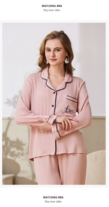 Detail of dry rose women's pajama set with button-down collar and Love embroidery