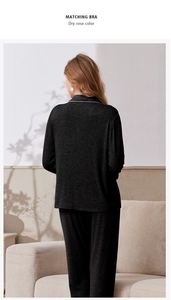 Detail of ribbed texture loungewear set with delicate pink piping and long sleeves