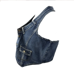 Detail of vintage washed dark blue denim halter top with metal buttons and stitched pockets