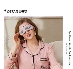 Pink striped pajama set detail showing soft rib-knit fabric, love embroidery, and matching eye mask