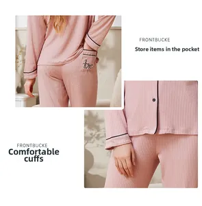 Detail of soft ribbed pink pajama set with Love embroidery and functional side pocket