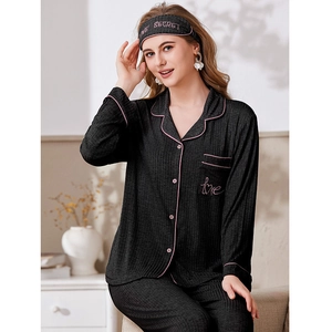 Dark grey ribbed long sleeve pajamas set for women with pink trim and matching eye mask