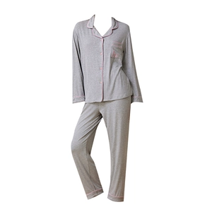 Women's grey knit pajama set with long sleeves and pink trim on soft ribbed fabric