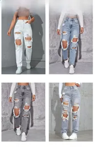 Detail view of high-waist ripped jeans in white, blue, light grey, and smoke grey colors