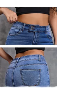 Close-up of blue high-waisted denim skirt with double button closure and neat stitching