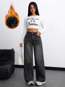 Detail view of high waist wide leg jeans with thermal lining and washed gray denim finish