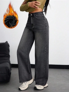 Detail view of winter high waist wide leg jeans with warm thermal fleece lining inside