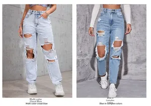 Gros plan de jeans déchirés en délavage bleu nuage et bleu moyen de style urbain rétro