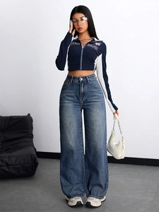 Jeans da donna casual a vita alta con gamba larga e un effetto lavaggio trendy