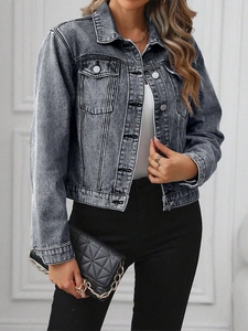 Short grey washed denim jacket for women with silver buttons and front flap pockets