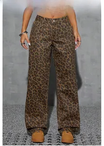 Detail view of retro leopard print high-waisted jeans with straight-leg cut and metal button