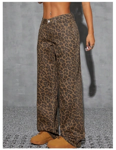 Detailed view of high-waist leopard print denim jeans with vintage wide-leg fit for women