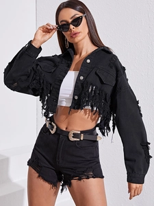 Detail of black washed denim jacket with frayed fringe hem and matching shorts