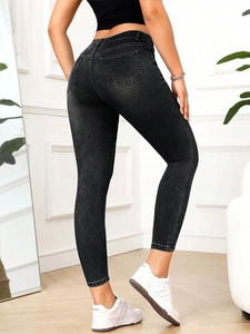 Jean skinny noir à taille haute pour femme, coupe ajustée et matière en denim extensible