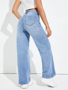 Rear view of light blue wide leg jeans for women showing high waist fit and back pockets