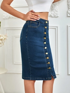 Detail view of high waist denim skirt featuring front decorative golden buttons