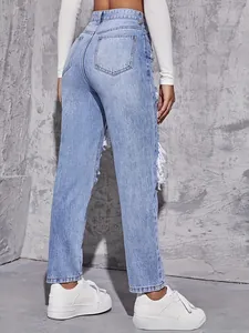 Rear view detail of high waisted straight jeans with distressed fringe and back pockets