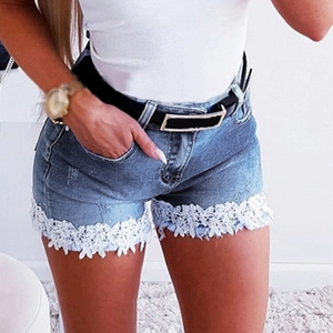 Slim fit denim shorts for women with white floral lace trim and elastic blue fabric