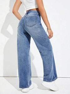 Rear side view of women's high-waisted wide-leg jeans in light blue denim with back pockets