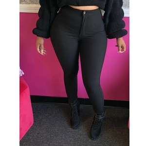 Leggings extensibles noirs à taille haute pour femmes avec bouton et fermeture éclair