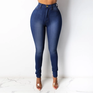 Detail view of high waist skinny jeans in dark blue wash with metallic button