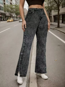 Vintage high waist grey acid wash flare jeans with side split and decorative metal buttons