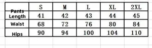 Detailed size chart for denim skirt with waist and hip measurements from S to 2XL