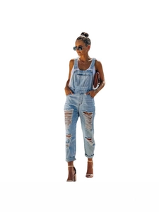 Women's light blue distressed denim overalls with ripped fringe detail and classic pockets