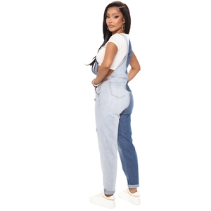 Women's slim fit denim overalls featuring asymmetrical blue color-block patchwork design