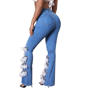 High-waisted flared blue jeans for women with unique mesh ruffle patchwork on side seams
