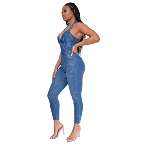 Slim fit halter neck denim jumpsuit in dark blue with v-neck and skinny leg design