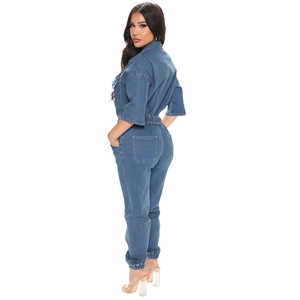 Women's blue denim jumpsuit with long sleeves, elastic waist, and cinched ankle cuffs