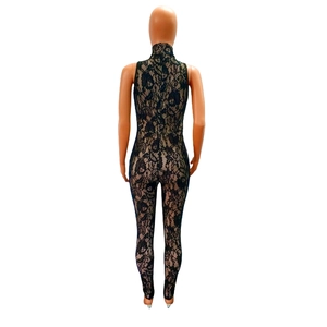 Rear view of black lace jumpsuit with intricate floral patterns on a mannequin