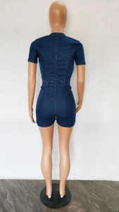 Rear view of slim-fit dark blue denim playsuit with detailed waist stitching