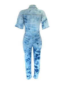 Rear view of tie-dye denim jumpsuit with classic back pockets and belt loops detail