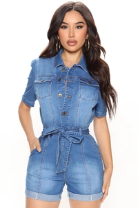 Detail view of denim short-sleeved jumpsuit with buttons and waist drawstring tie
