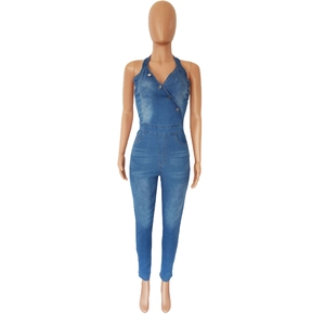 Detail of blue halter neck denim jumpsuit with metallic button decor and slim fit cut