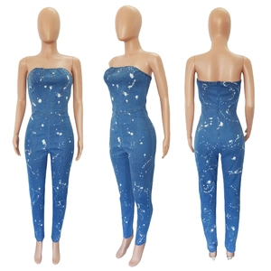 Three-view layout of a slim fit strapless denim jumpsuit with white splatter bleach pattern
