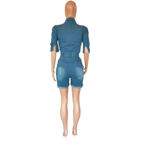 Rear view of slim fit denim jumpsuit with waist belt loops and washed texture details