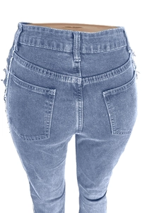Detail of light blue distressed jeans showing back pockets and side frayed fringes