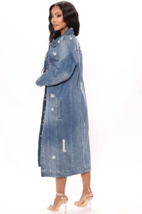 Detailed back view of a long distressed denim trench coat with ripped fringe and frayed edges
