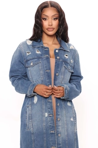 Detailed view of mid-blue distressed denim coat featuring heavy ripped and frayed texture