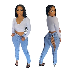 Jean skinny bleu clair pour femme avec lacets croisés au dos et taille haute tendance