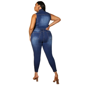 Women's tight denim jumpsuit in dark blue with back view showing distressed washed effect